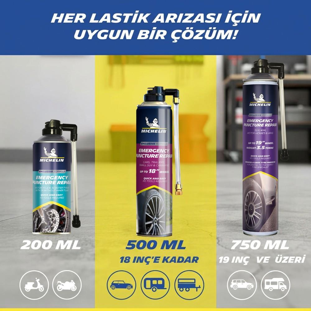 Atölye zemininde 200ml, 500ml ve 750ml boyutlarında üç Michelin acil durum lastik tamir spreyi.