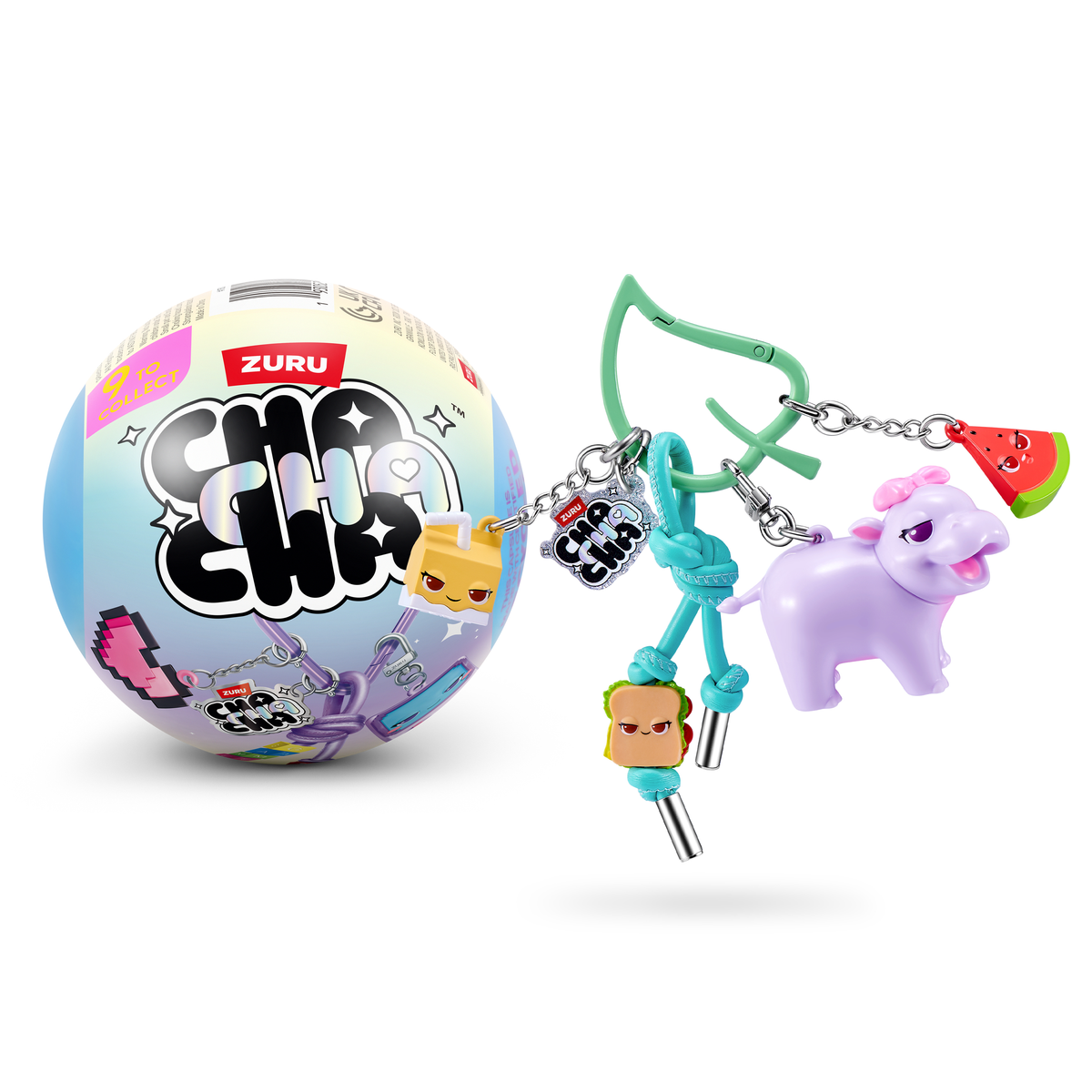 Bola misteriosa Zuru Chacha con dijes que incluyen una vaca morada, un sándwich y una sandía.