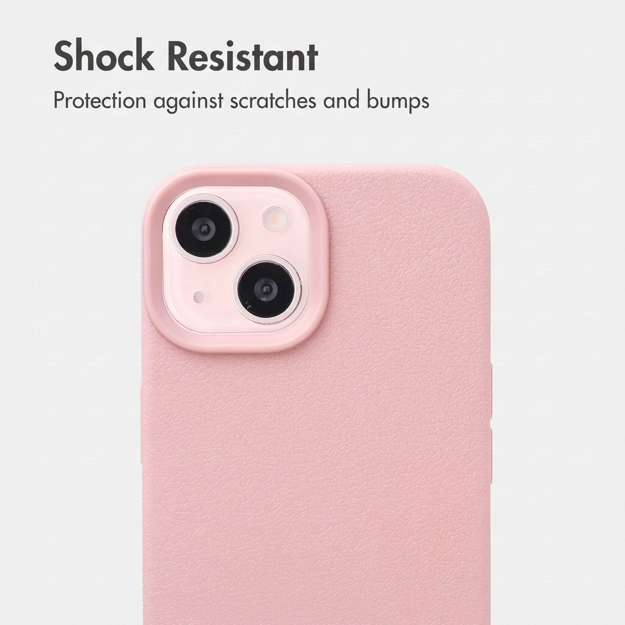 Rosa Handyhülle mit Kameraausschnitt und Text Shock Resistant vor hellem Hintergrund.