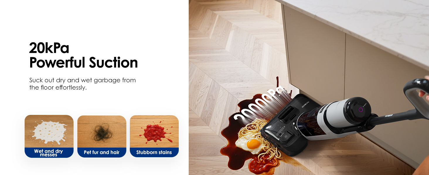 Ein Staubsauger reinigt einen verschmutzten Boden mit verschütteten Lebensmitteln neben einem Küchenschrank.