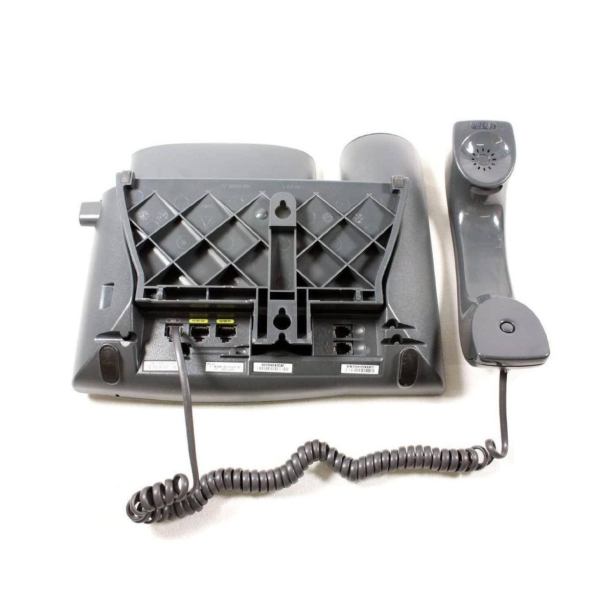 Vista posteriore di un telefono IP grigio con cornetta collegata, cavo e staffa a muro.