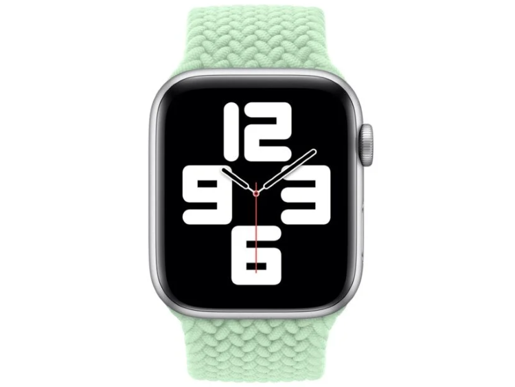Uno smartwatch con cassa argentata, cinturino verde intrecciato e schermo nero con grandi numeri.