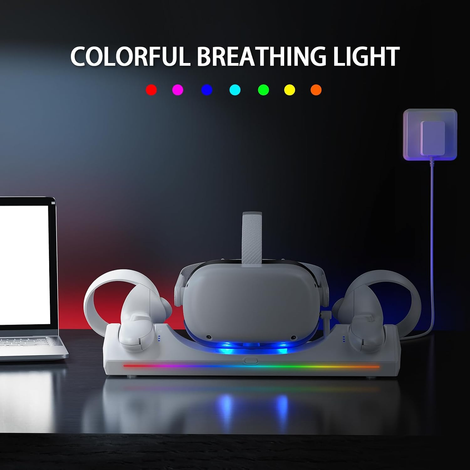 Ein weißes VR-Headset und Controller auf einer Ladestation mit bunten LED-Lichtern, neben einem Laptop.