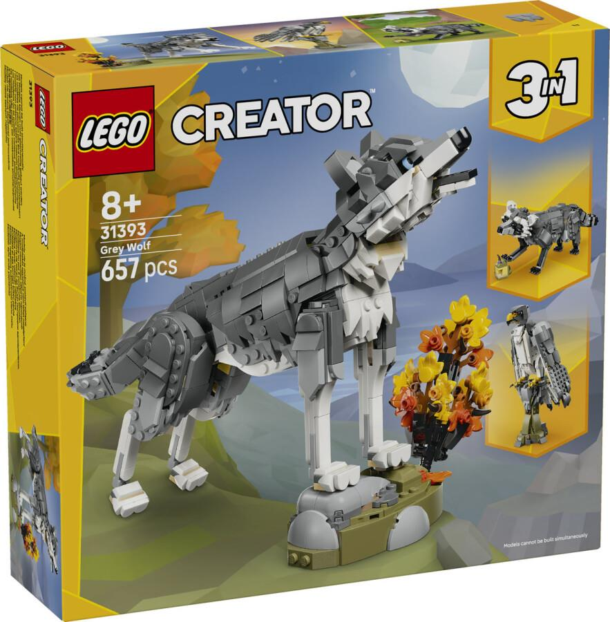 Küçük bir ağaç ve kayalarla yapılmış gri kurt modelini gösteren LEGO Creator 3'ü 1 arada Gri Kurt kutusu.