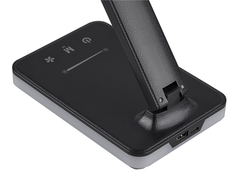 Czarna podstawa lampy z dotykowym panelem sterowania i portami USB.