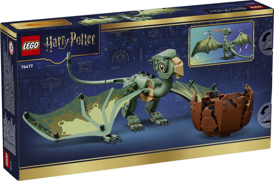 Mavi kutu üzerinde yeşil ejderha ve kahverengi yumurtalı LEGO Harry Potter seti.