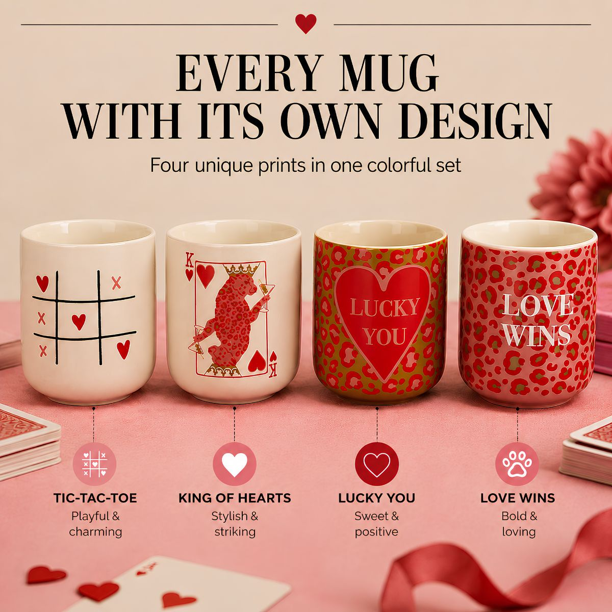 Four colorful mugs with unique patterns like tic-tac-toe and leopard print sit side-by-side on a pink table.