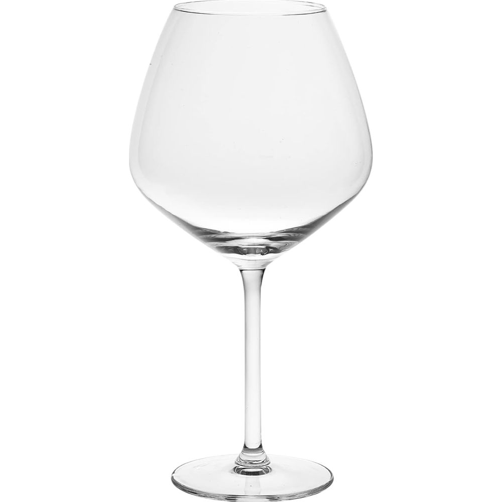 A clear empty wine glass with a wide bowl, a long stem, and a round base against a plain white background.