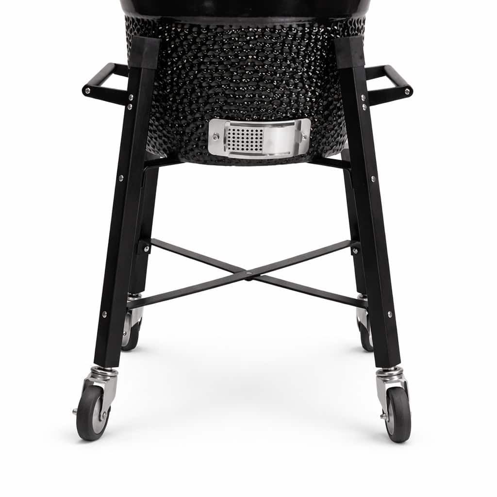 Untergestell eines schwarzen Keramikgrills auf Rollen mit silbernem Lufteinlass.
