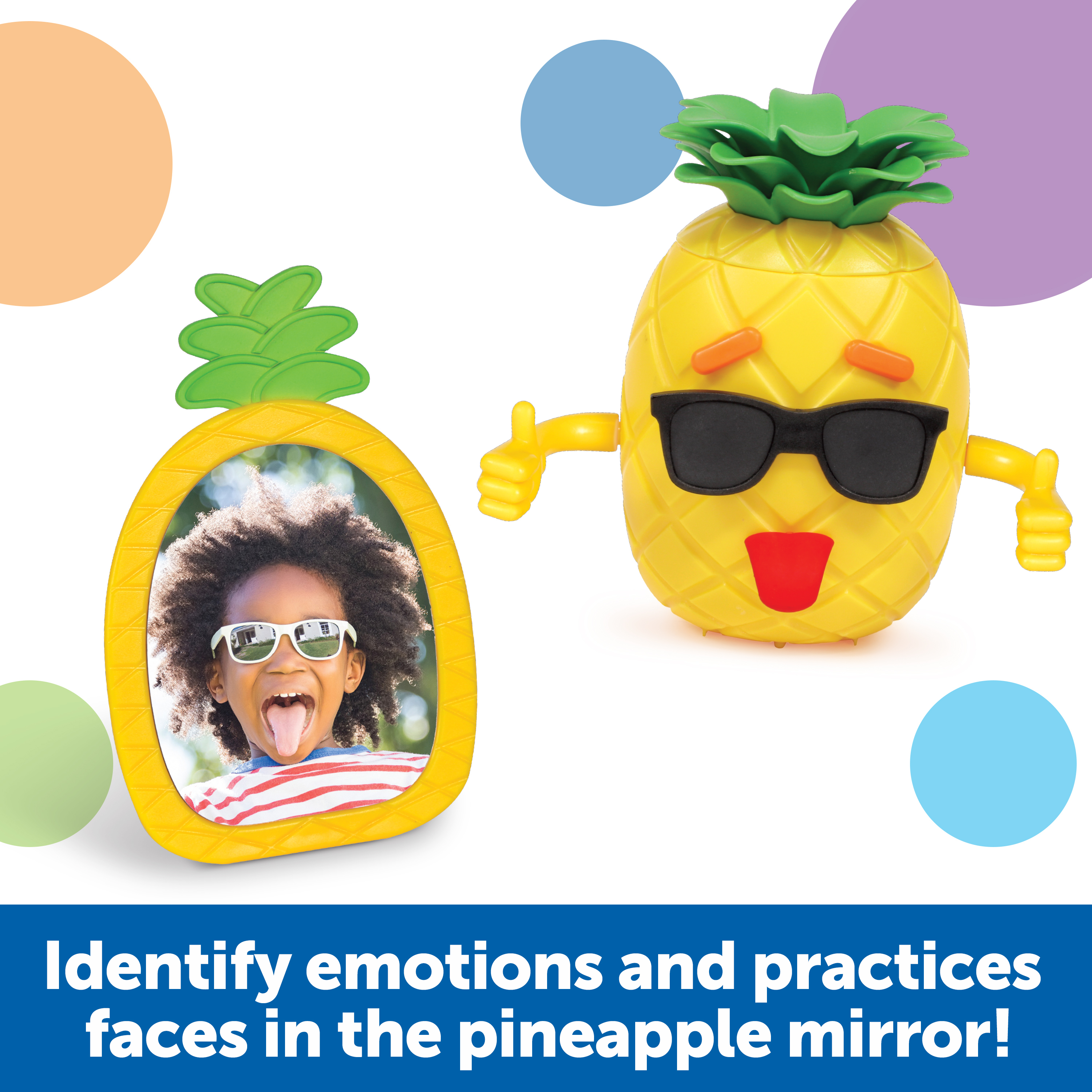 Ananas-Spielzeug mit Sonnenbrille und ein Ananas-Spiegel mit dem Bild eines Kindes, das eine Zunge herausstreckt.