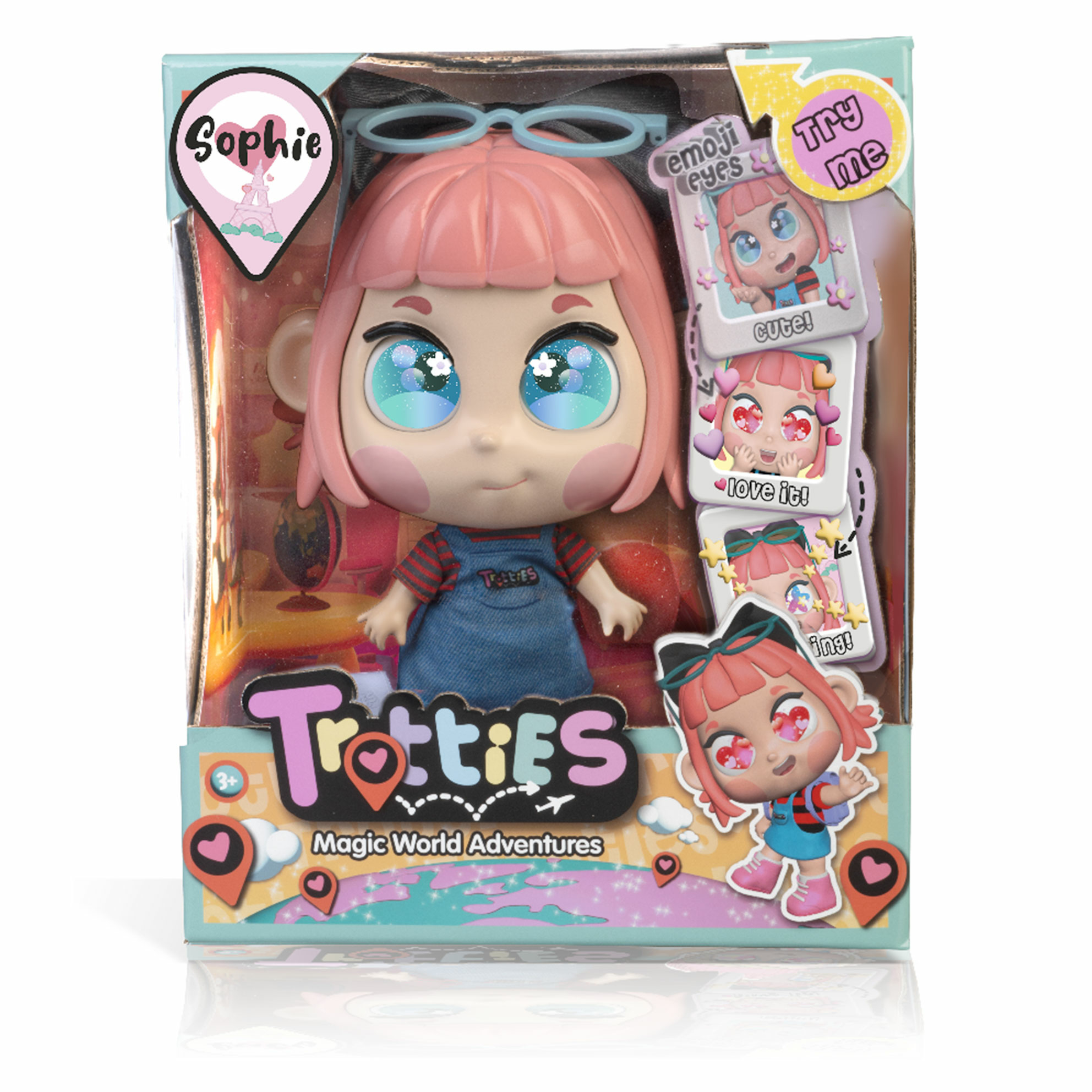 Trotties Sophie Puppe mit pinkem Haar und blauen Augen in einer bunten Schachtel mit Emoji-Augen.