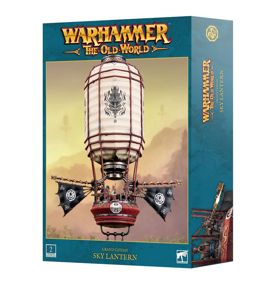 Spielverpackung von Warhammer The Old World Grand Cathay Sky Lantern mit Laternenluftschiff auf Bergkulisse.
