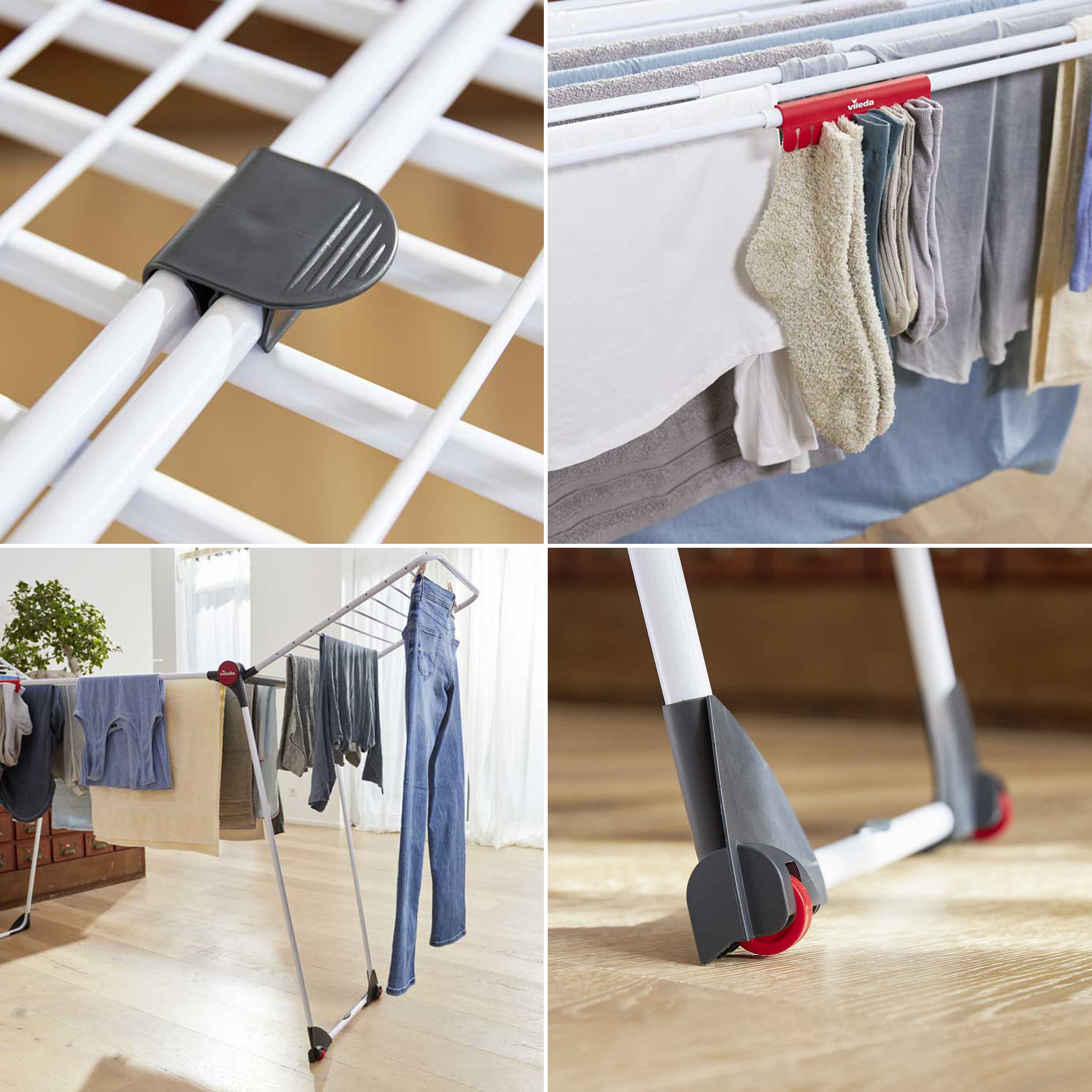 Ein weißer Wäscheständer mit schwarzem Halter, Socken und Jeans in einem hellen Raum.