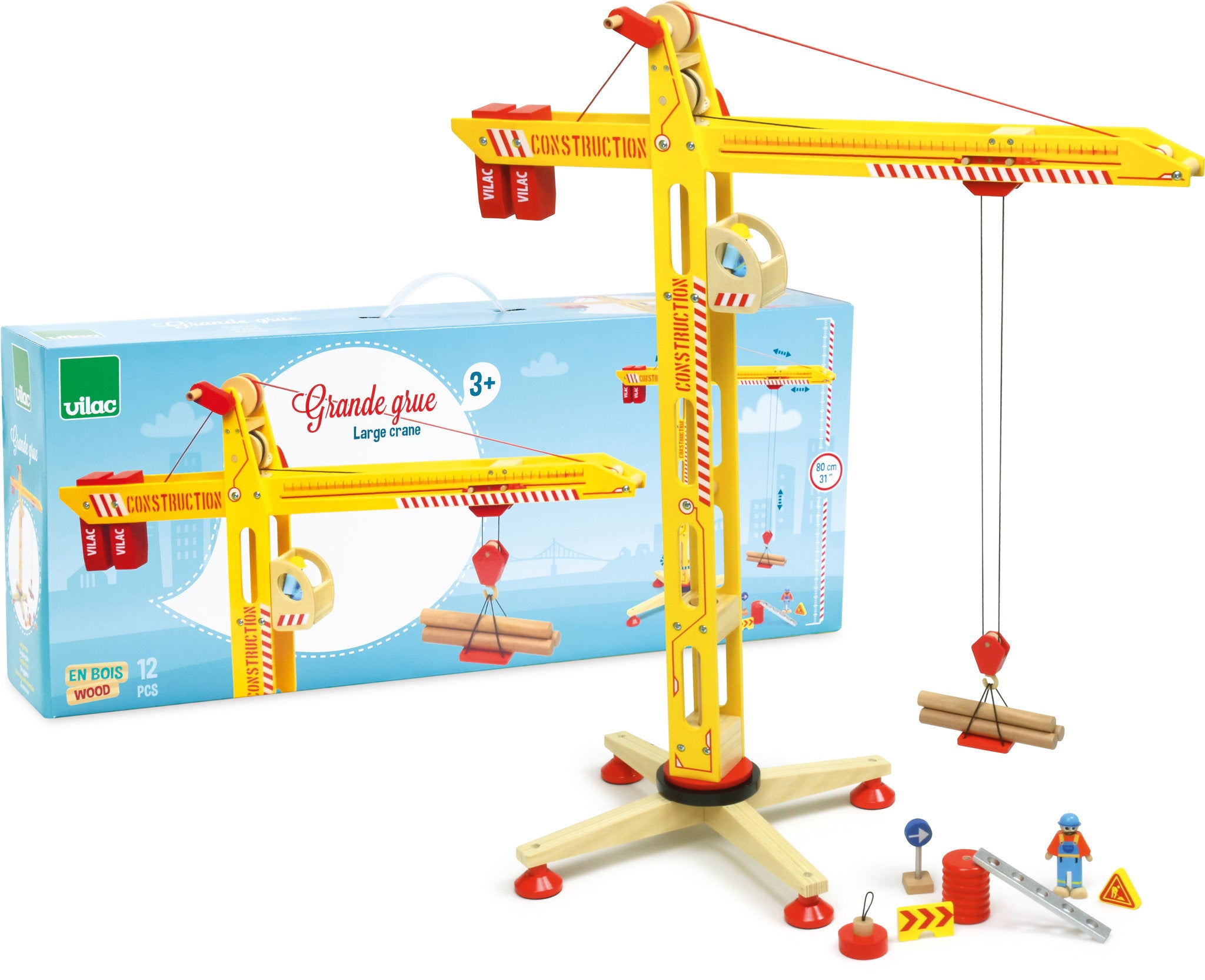 Ein gelber Holzbaukran mit Zubehör vor einer blauen Produktverpackung.