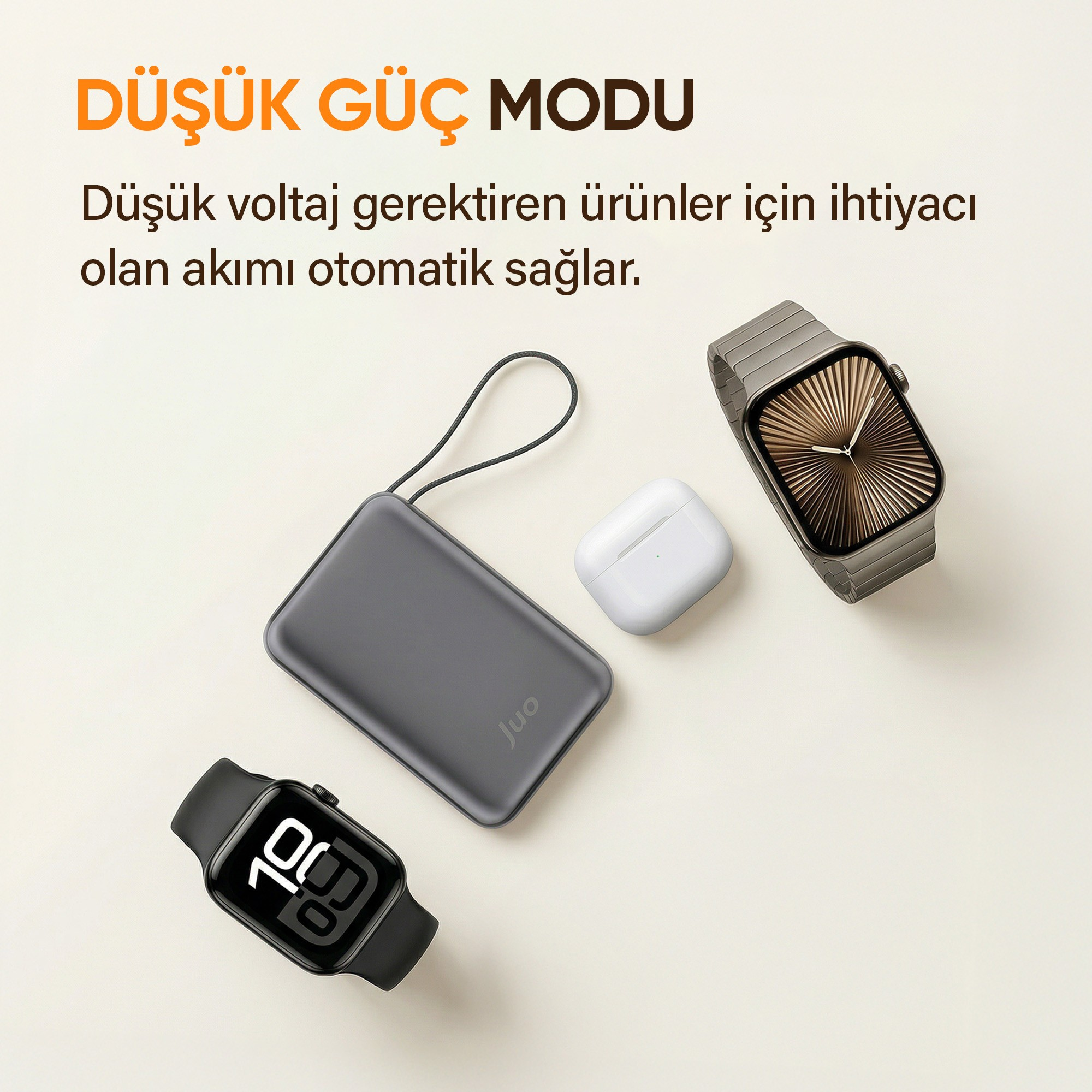 Açık renkli arka planda gri taşınabilir şarj cihazı, iki akıllı saat ve beyaz kulaklıklar ile üzerinde Türkçe yazı.