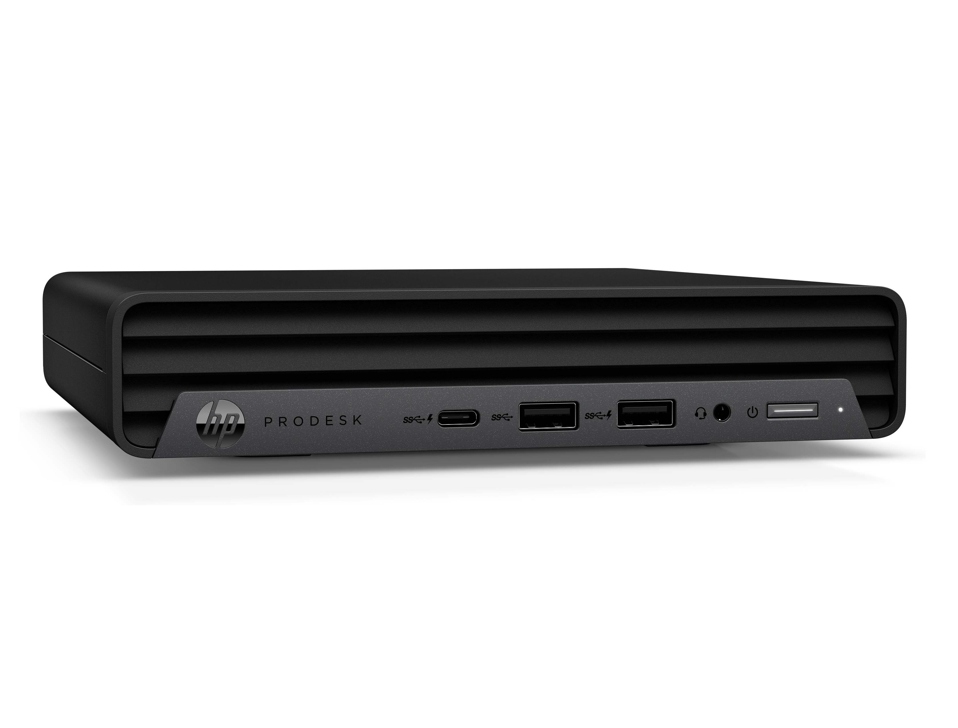 Czarny mini PC HP ProDesk na białej powierzchni, z portami USB z przodu.
