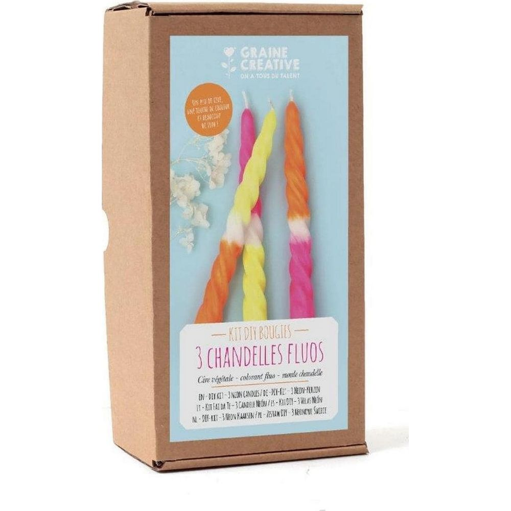 Verpackung eines DIY-Kits mit drei bunten Neonkerzen.