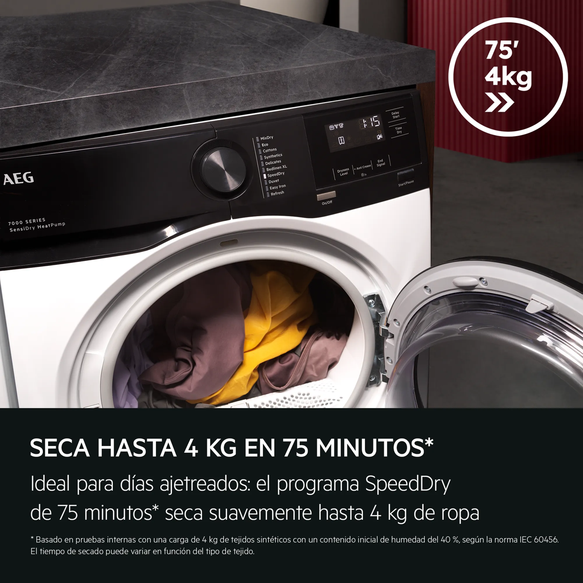 Una secadora AEG con la puerta abierta, llena de ropa de colores, y texto en español.