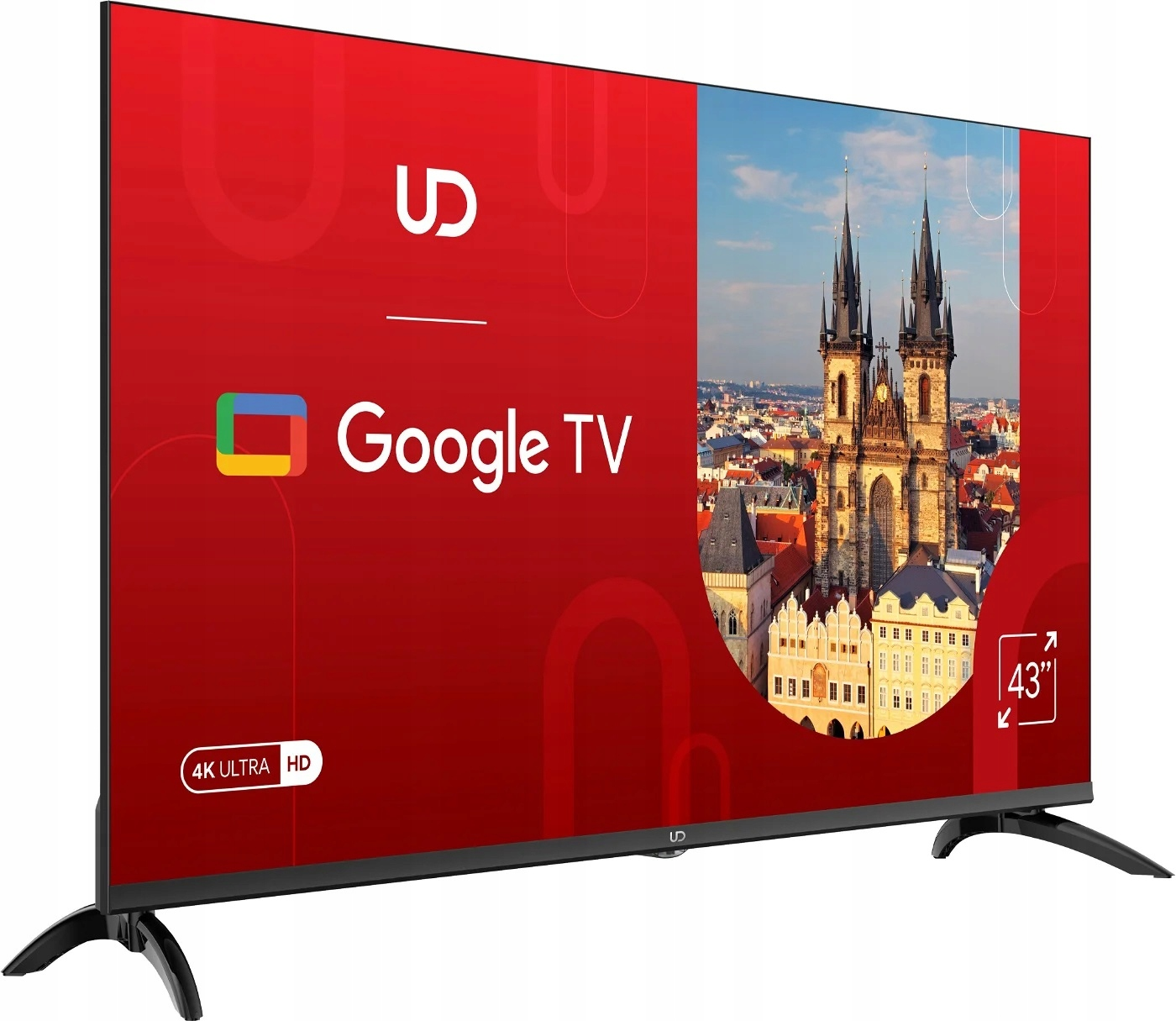 43-calowy UD Google TV wyświetla czerwony ekran z logo i wieżami gotyckiej katedry.