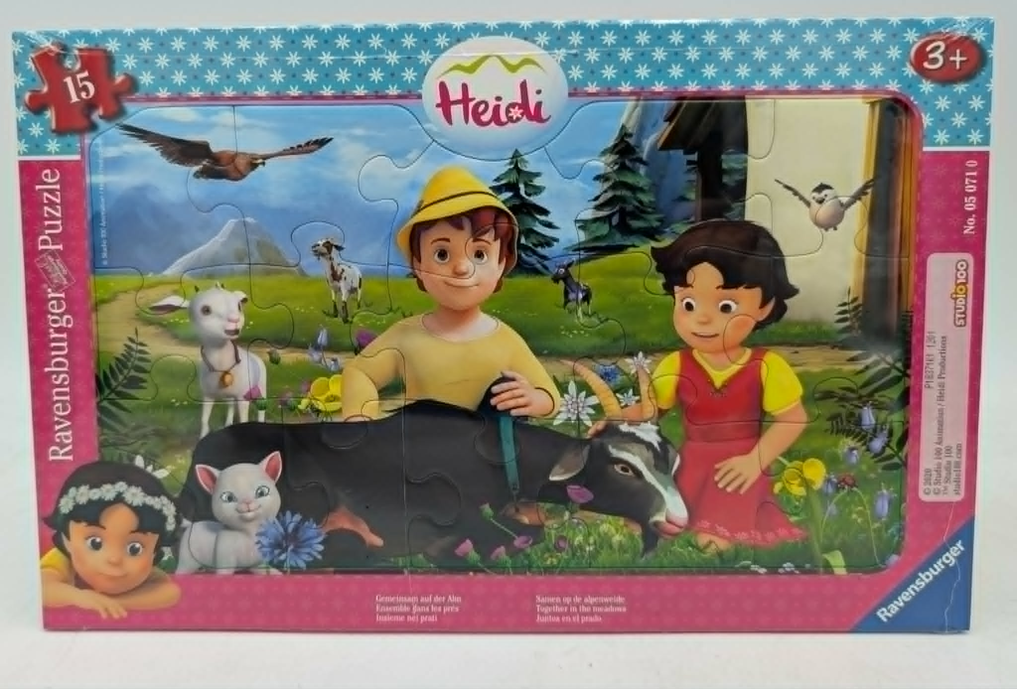 Ravensburger-Kinderpuzzle mit Heidi-Motiv, Alpinlandschaft, Tieren und Figuren auf blauer gemusterter Verpackung.