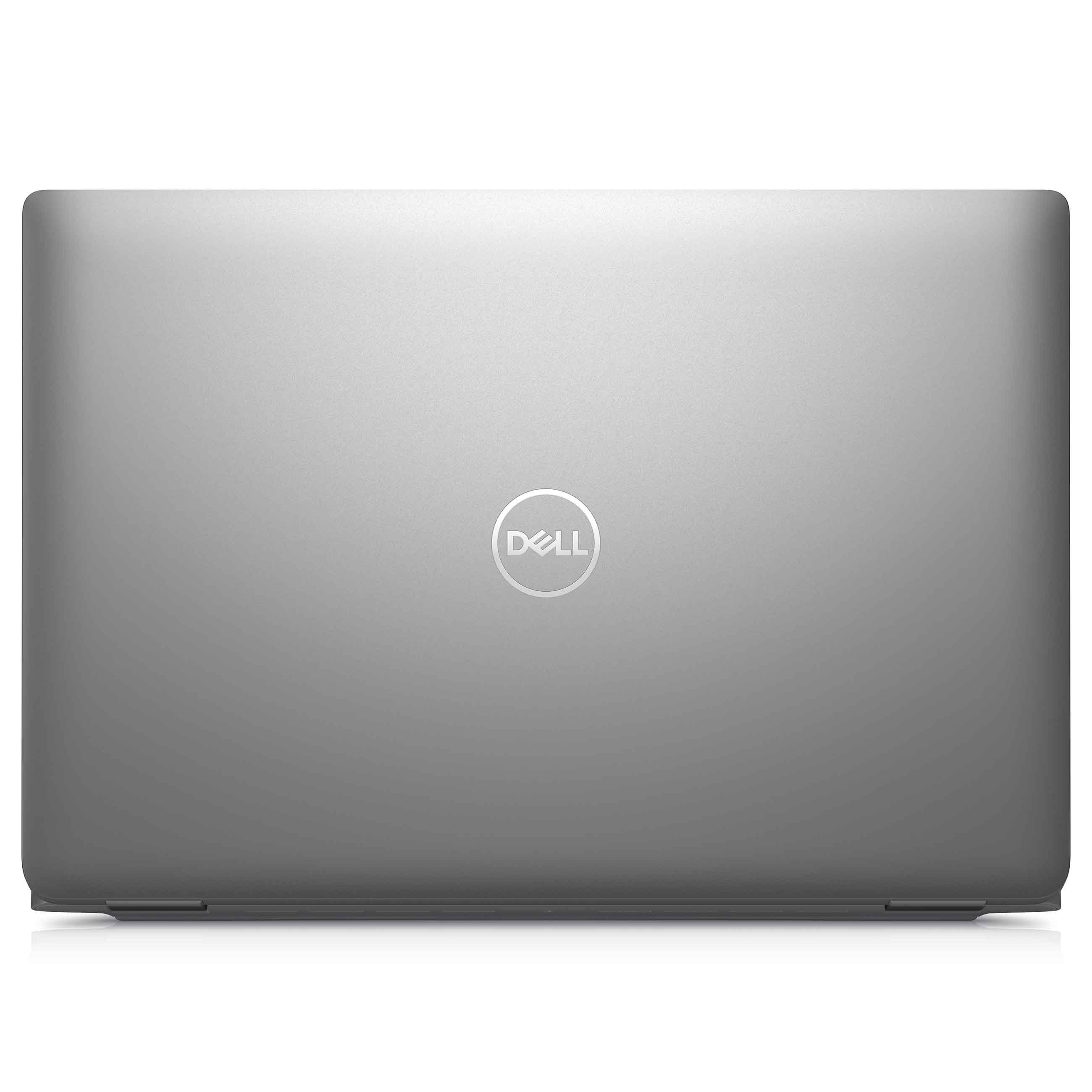 Geschlossener silbergrauer Dell-Laptop mit zentriertem runden Logo auf weißem Hintergrund.