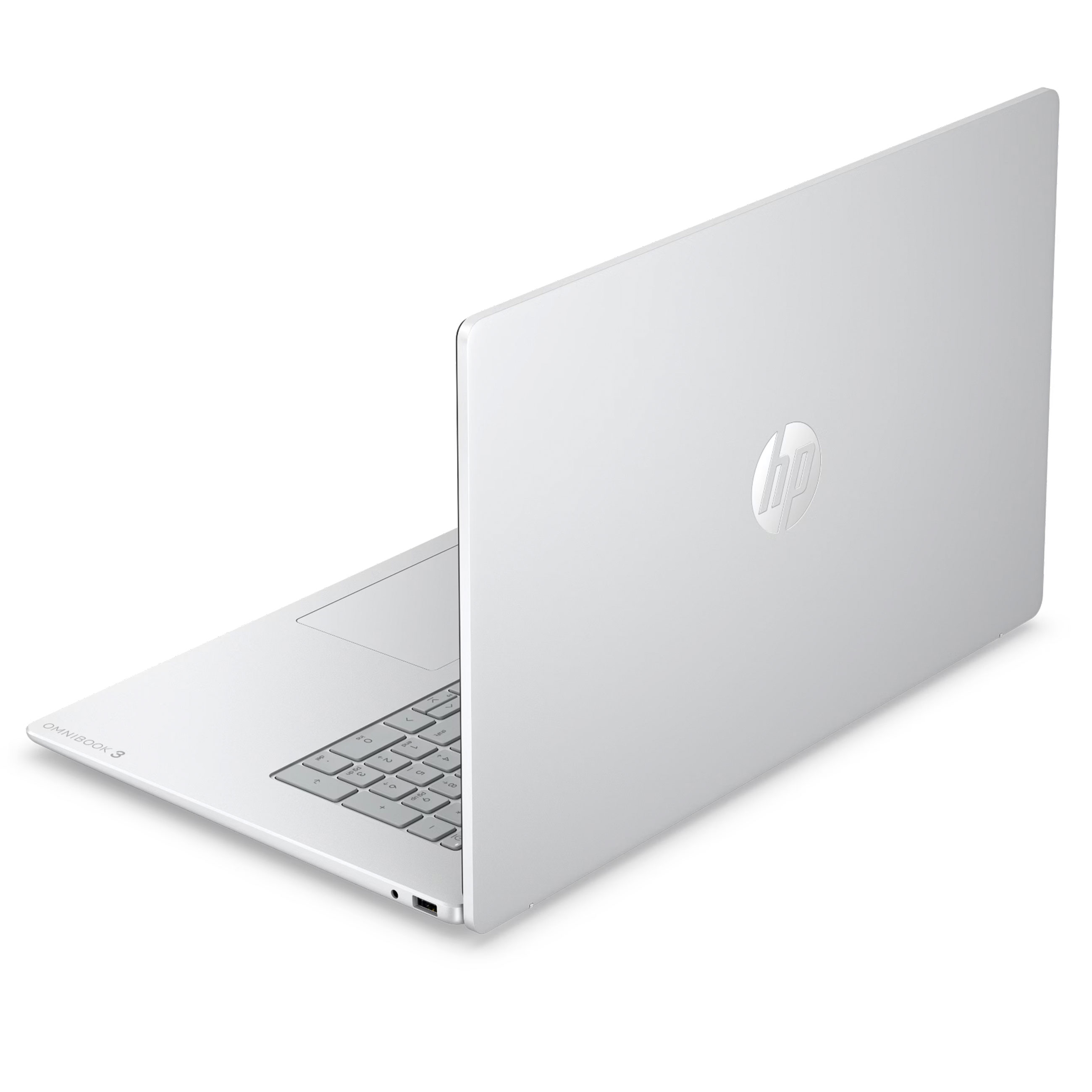 Ein silberner HP Omnibook 3 Laptop steht auf einer weißen Oberfläche, die geschlossene Bildschirmrückseite zeigt das HP-Logo.