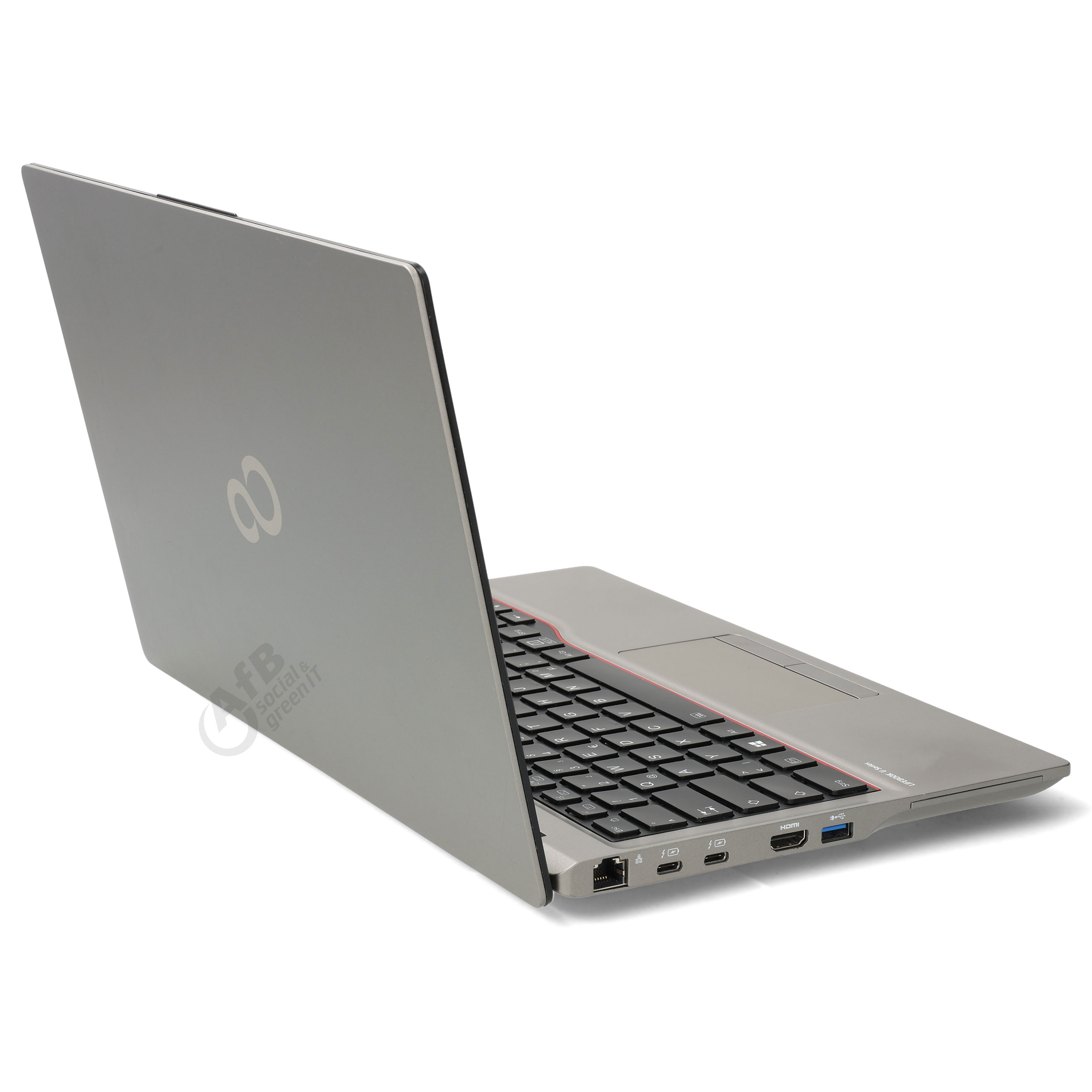 Ein grauer Laptop steht halb geöffnet auf weißem Hintergrund, seitlich sind Anschlüsse sichtbar.
