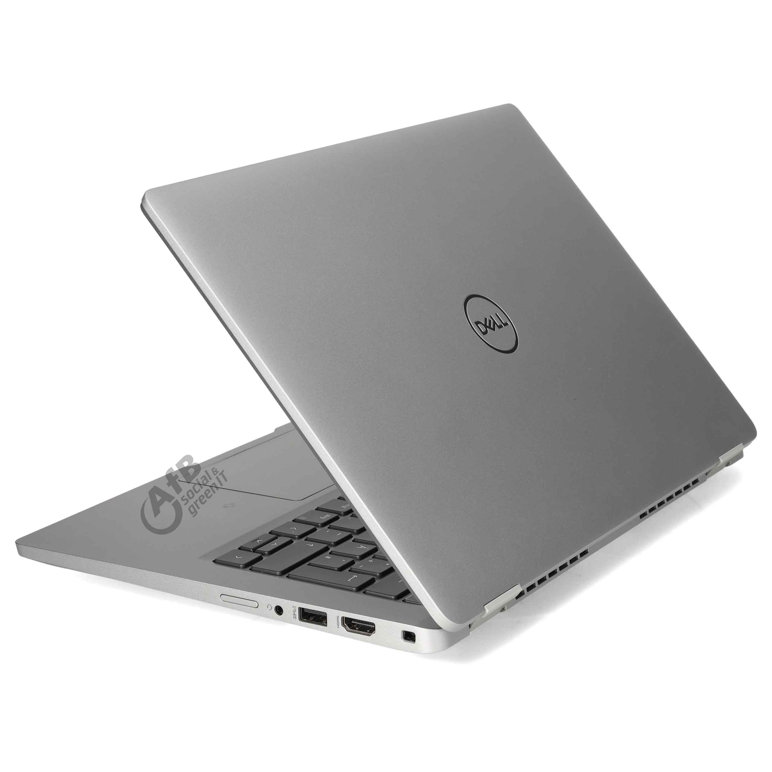 Ein silberner Dell-Laptop von der Seite, mit Tastatur, Anschlüssen und geschlossenem Deckel auf weißem Grund.