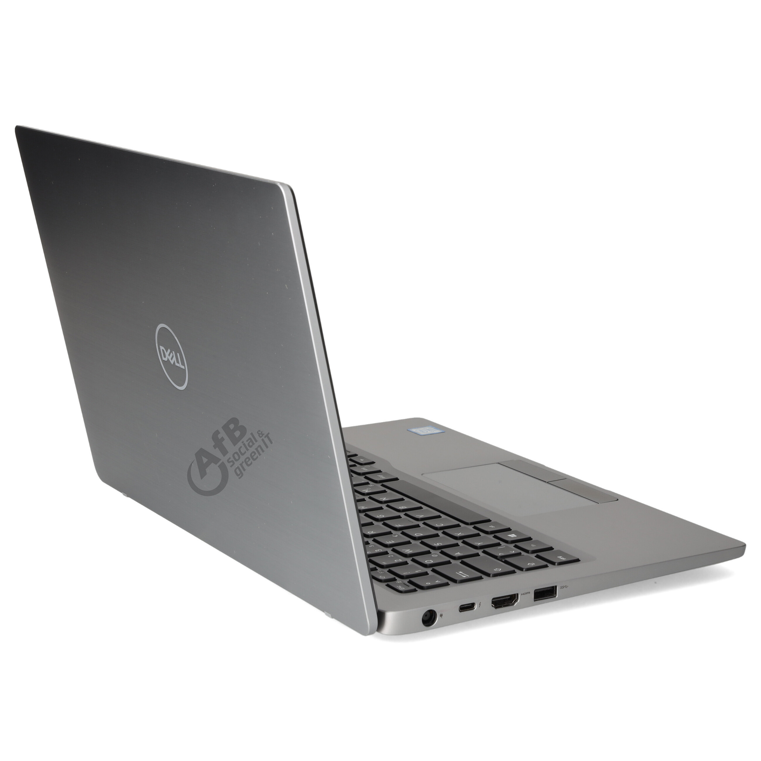 Ein offener silberner Dell Laptop zeigt das Tastaturlayout und Anschlüsse auf einer weißen Oberfläche.