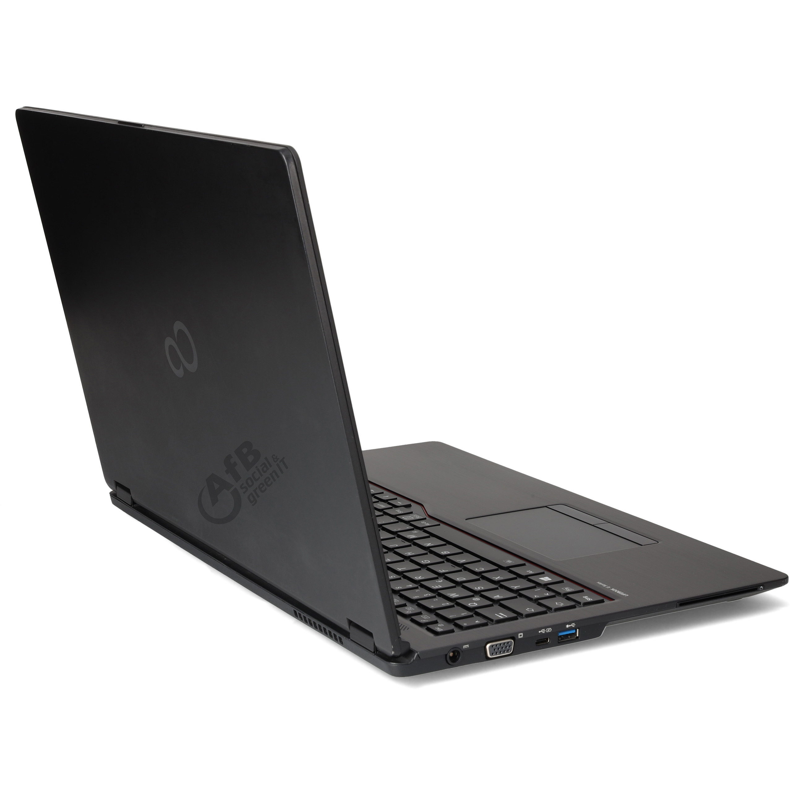 Ein offener schwarzer Laptop steht auf einer weißen Oberfläche, gesehen von schräg hinten.