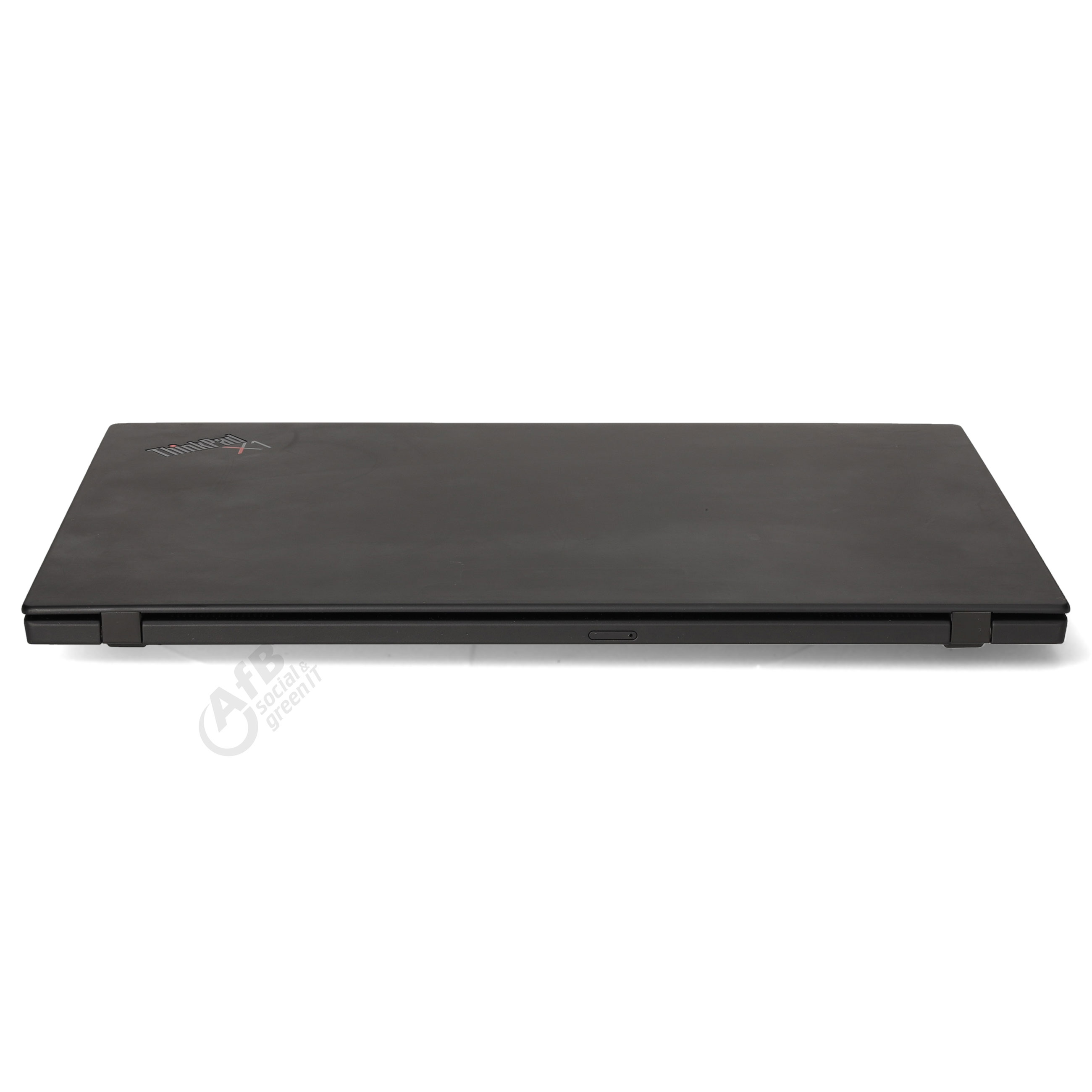 Ein geschlossener schwarzer ThinkPad X1 Laptop liegt flach auf einer weißen Oberfläche mit sichtbarem Logo.