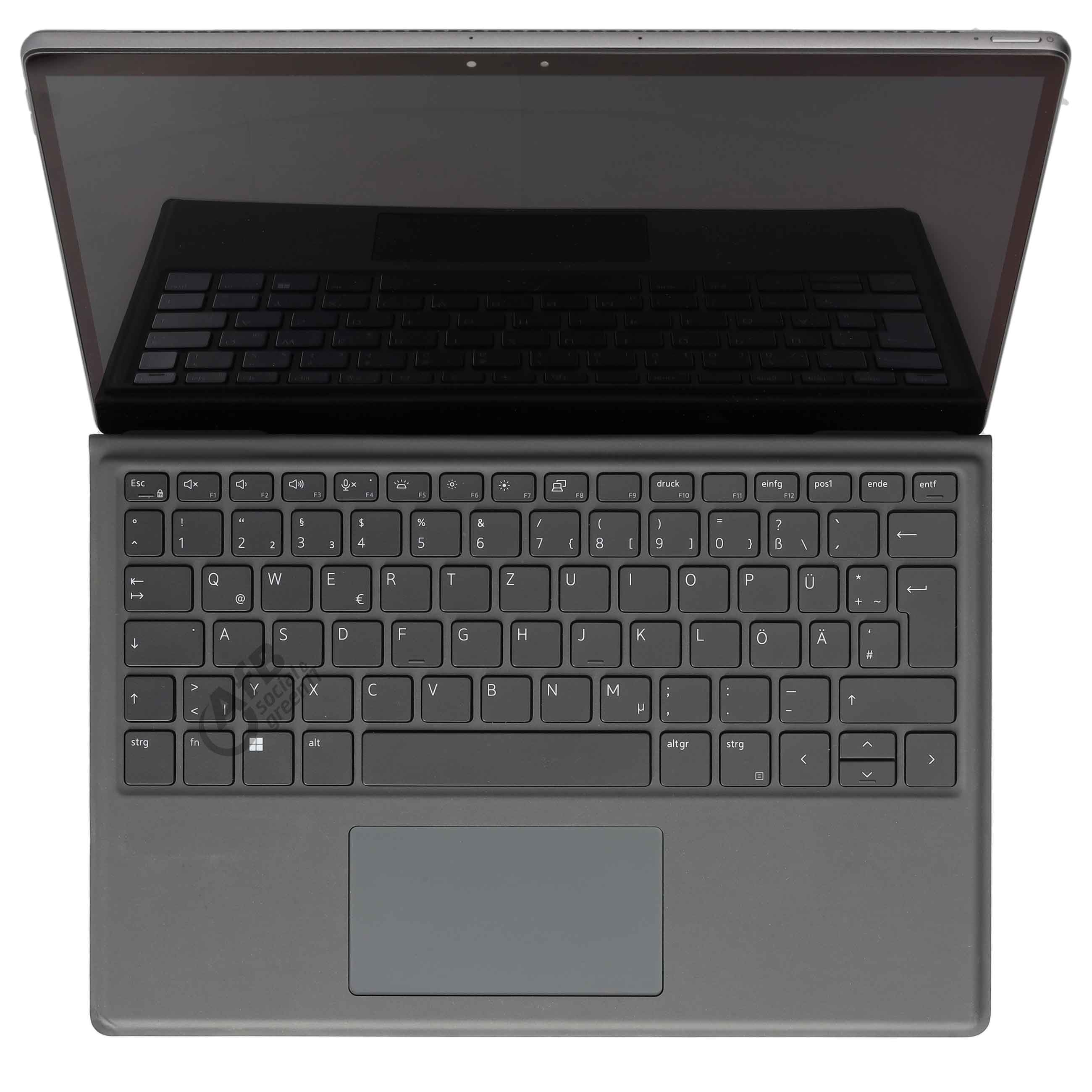 Ein graues Tablet mit angeschlossener deutscher QWERTZ-Tastatur und integriertem Touchpad.