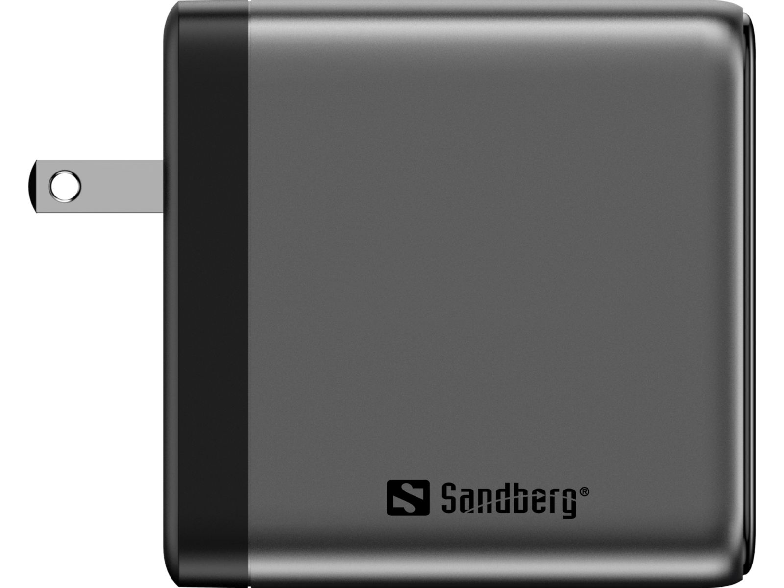 Ein graues Sandberg USB-Ladegerät mit schwarzem Akzent und Metallstecker vor weißem Hintergrund.