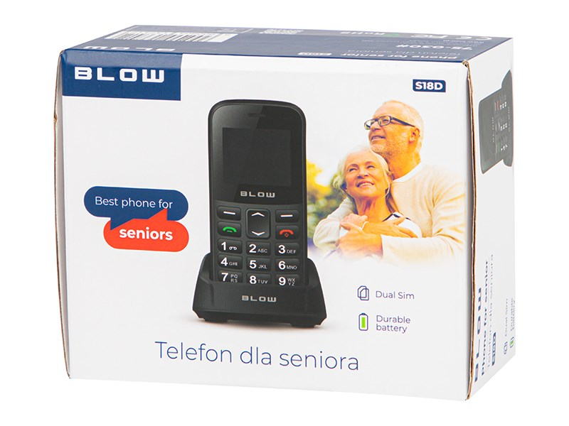 Confezione di un telefono per anziani BLOW nero in una base di carica con una coppia anziana.