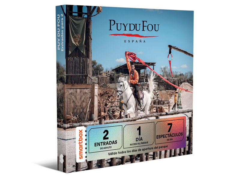 Un jinete en caballo blanco sostiene una tela roja en Puy du Fou España. Caja Smartbox.