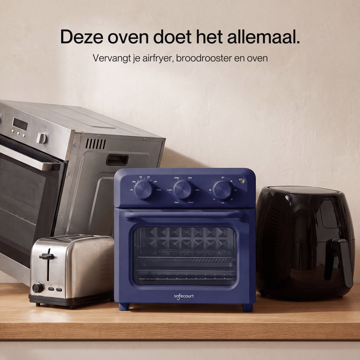 A blue mini oven, silver toaster, oven, and black airfryer on a wooden counter with Dutch promotional text.