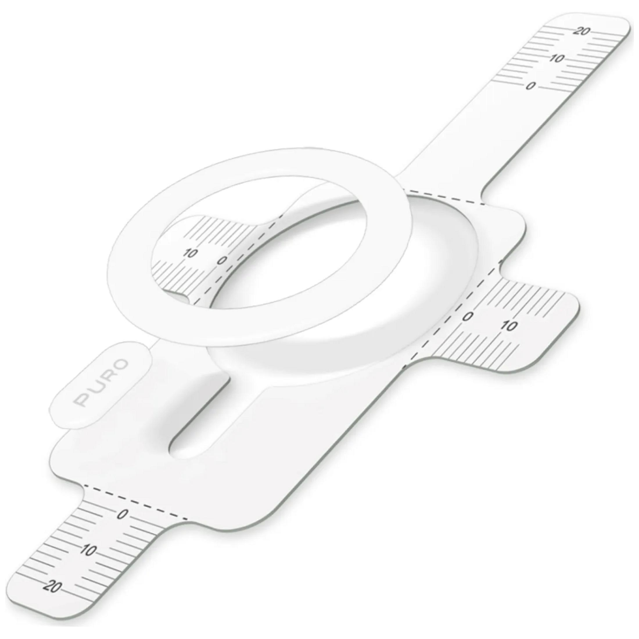Herramienta de medición plana blanca con escalas y un anillo circular sobre fondo blanco.