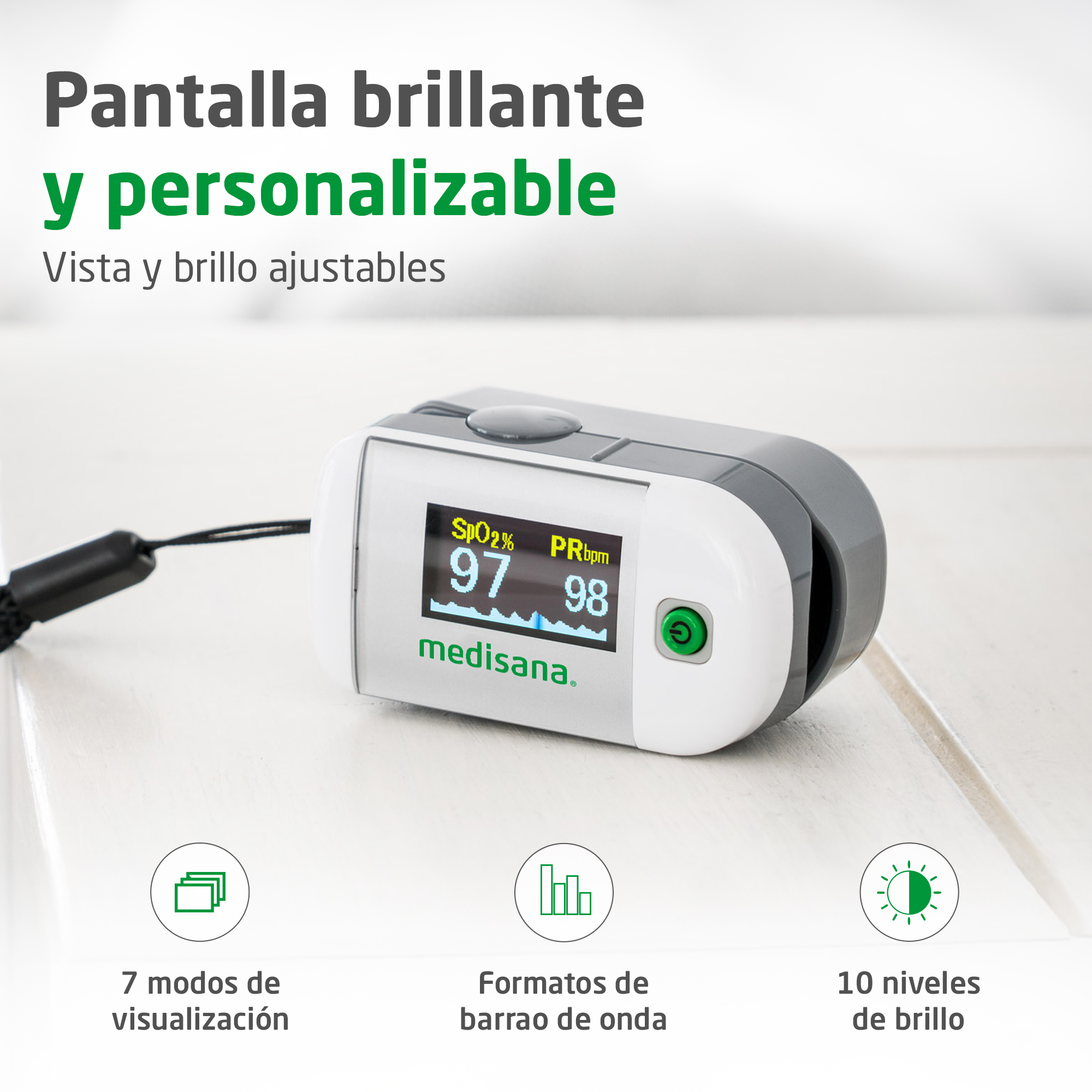 Medisana pulse oximeter on a white table showing digital readings and icons.