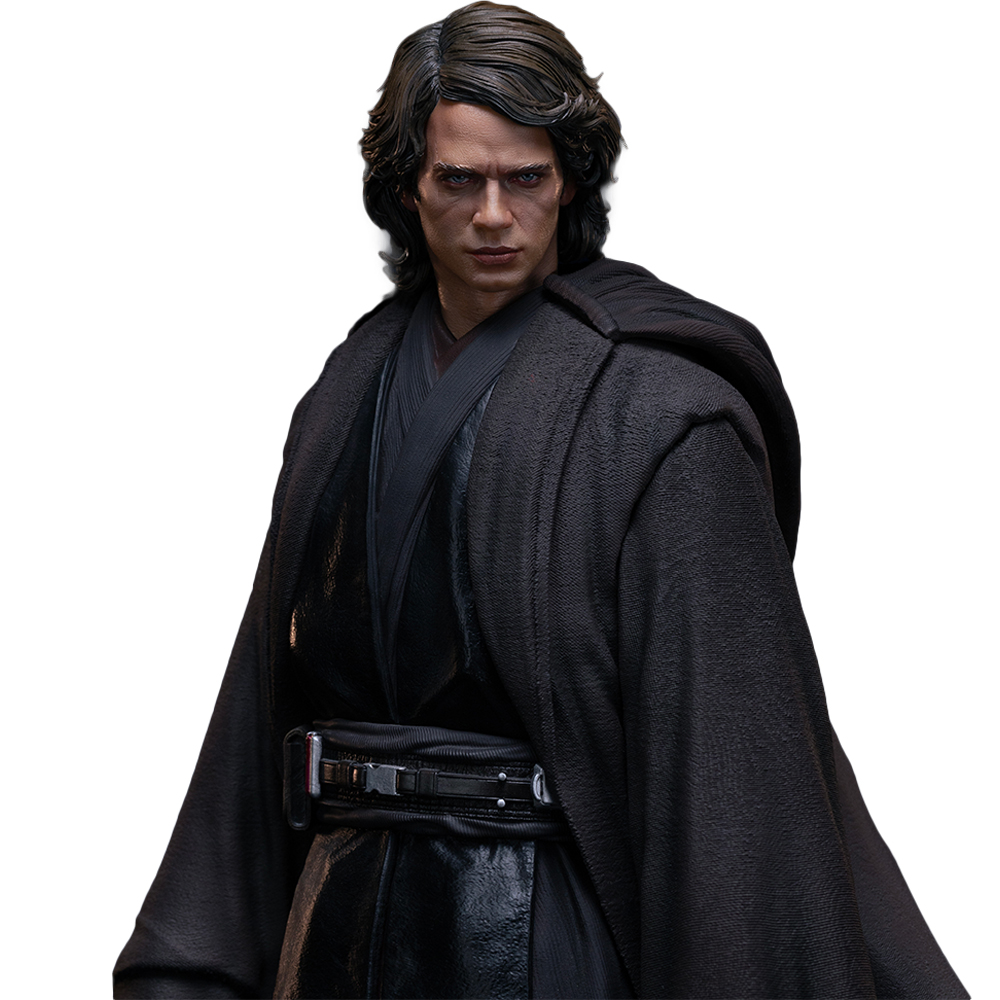 Una figura dettagliata di Anakin Skywalker con capelli scuri indossa vestiti da Jedi neri e un mantello.
