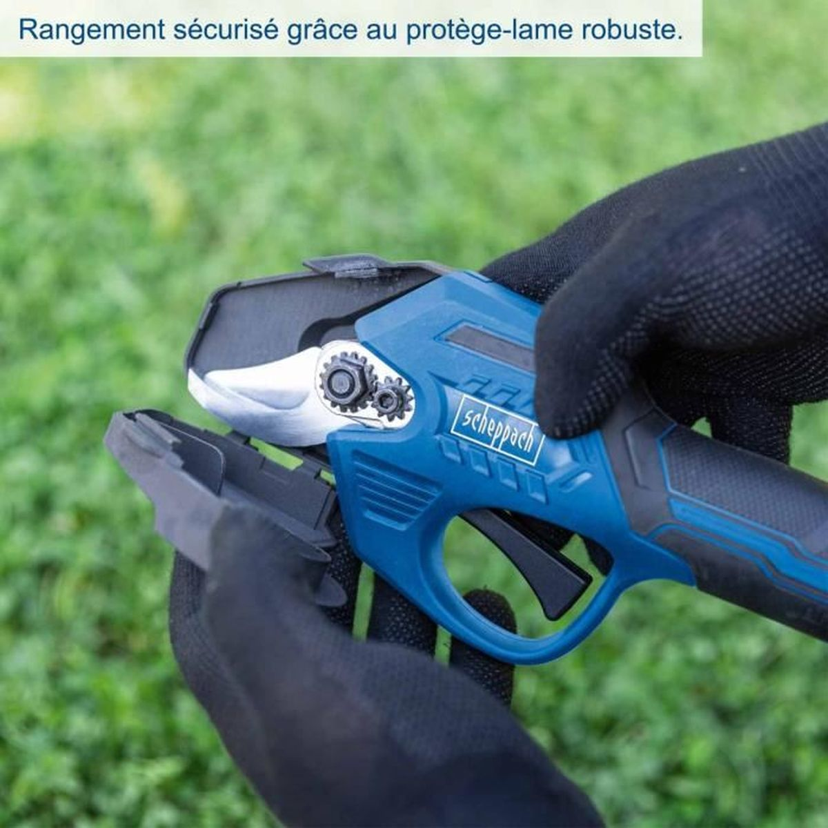 Gloved hands putting a blue Scheppach pruning shear into its protective blade cover.