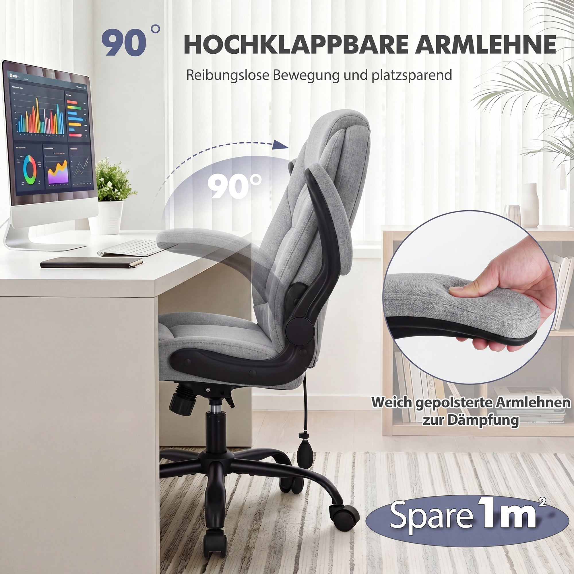 Grauer Buerostuhl mit 90 Grad klappbaren gepolsterten Armlehnen am Schreibtisch.