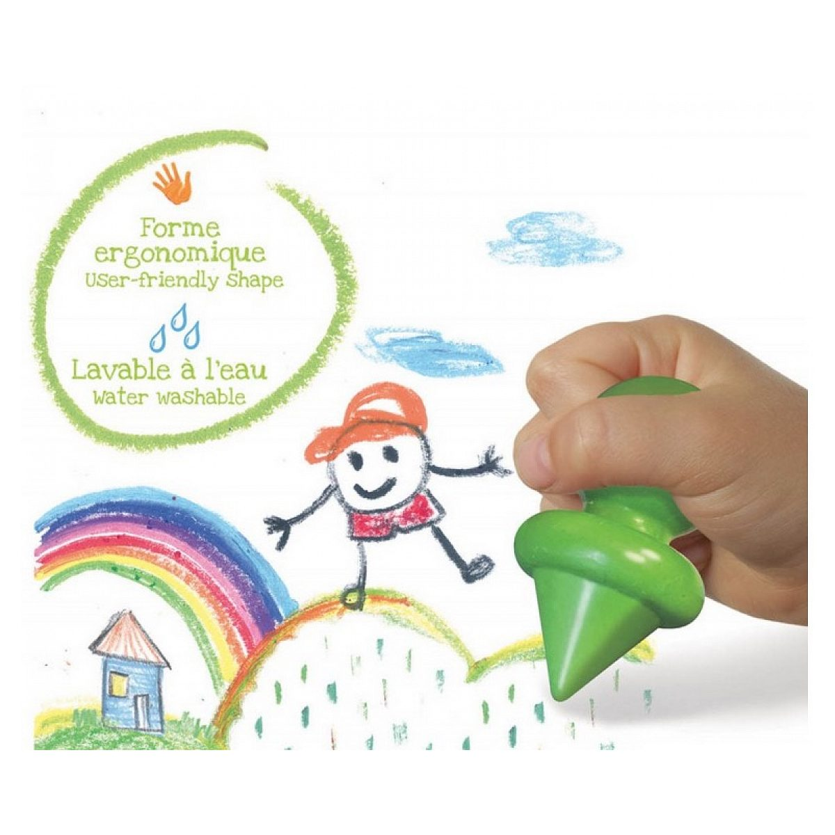 Eine Kinderhand hält einen grünen Kegelstift über eine Zeichnung mit Regenbogen, Haus und Text.