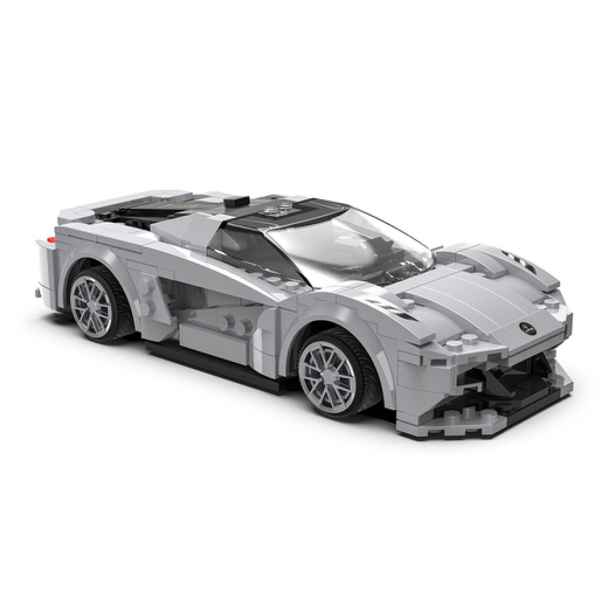 Ein graues Spielzeugauto im Lego-Stil aus Bausteinen mit transparenten Fenstern.