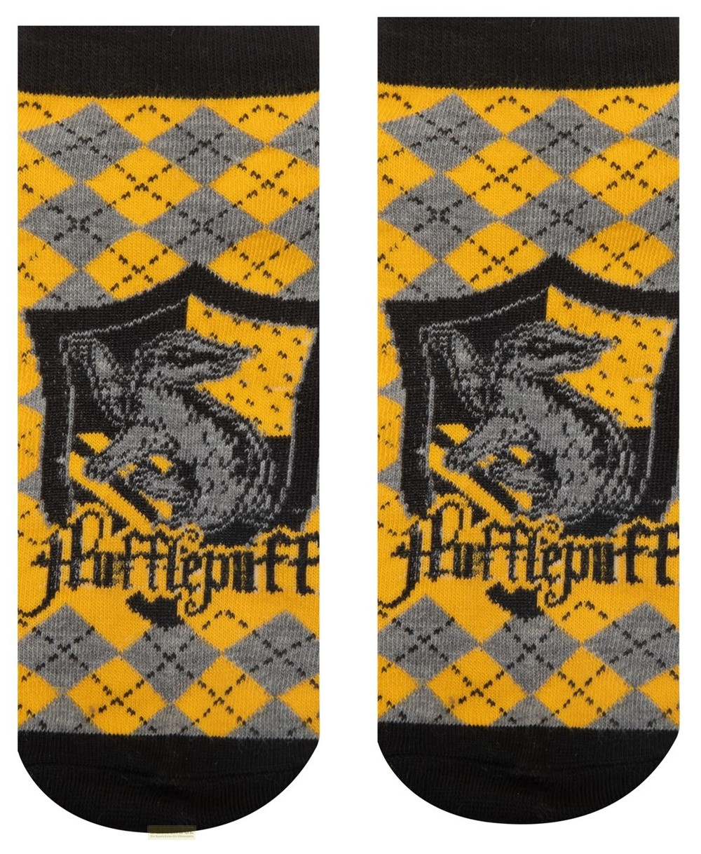 Calcetines de Hufflepuff con patrón de rombos amarillo y gris y escudo de tejón.