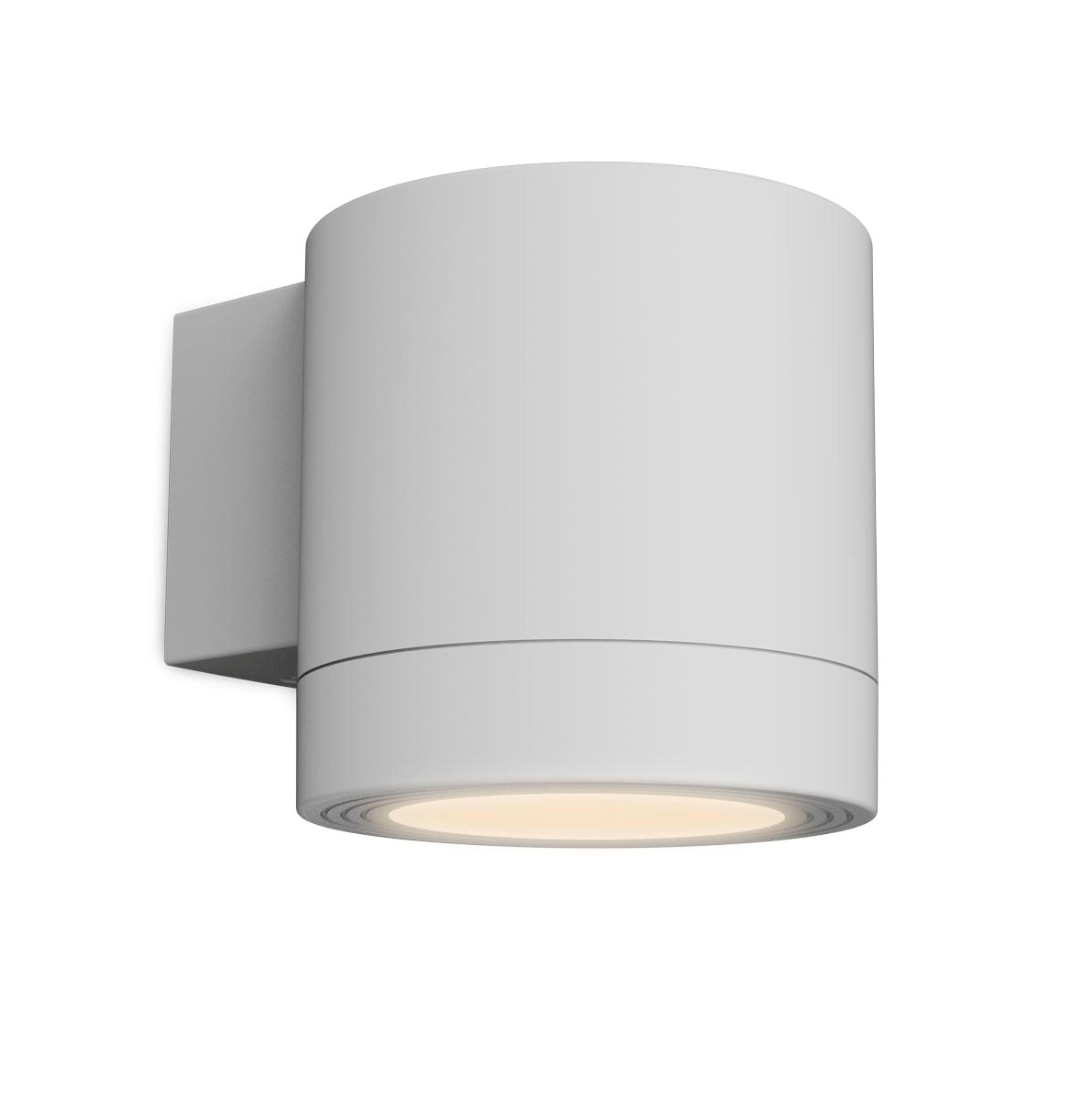Een moderne witte cilindrische wandlamp met warm licht.