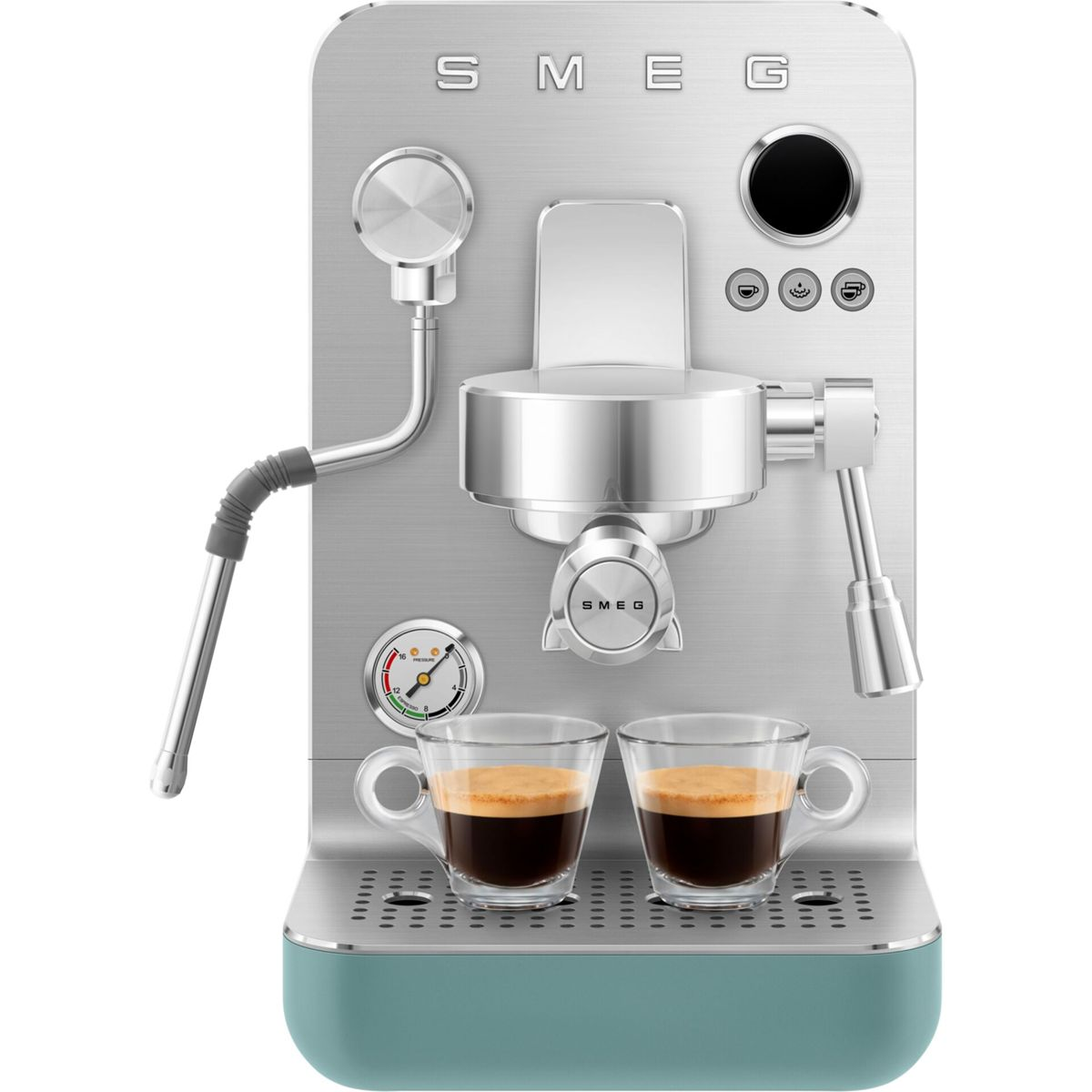 Cafetera espresso Smeg de acero inoxidable con dos tazas de café sobre base verde.