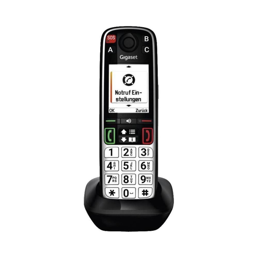 Un telefono per anziani Gigaset nero in una base di ricarica con display grande e pulsanti.