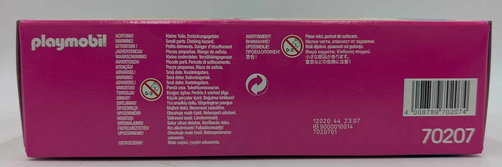 Parte trasera de la caja de juguetes Playmobil con advertencias de peligro de asfixia y código de barras.