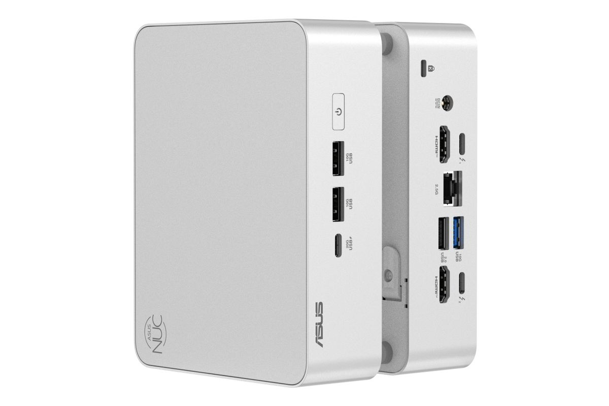 Mini PC ASUS NUC plateado mostrando los paneles frontal y trasero con puertos USB y HDMI sobre fondo blanco.