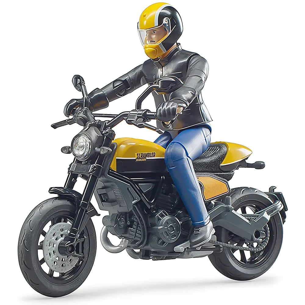 Eine Spielzeugfigur in Motorradkleidung sitzt auf einem gelb-schwarzen Scrambler-Motorrad vor weißem Hintergrund.
